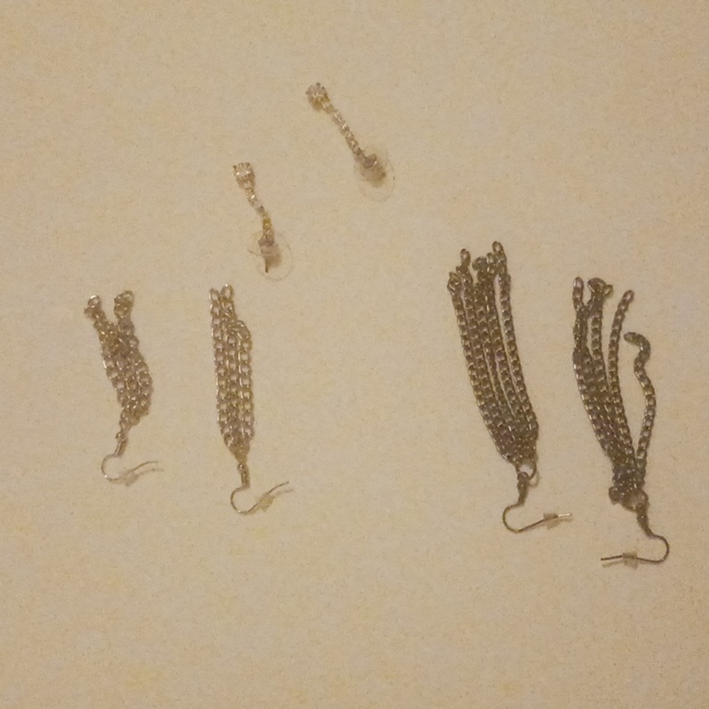 Three pairs dangly earrings